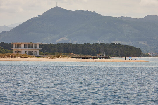 Tranquil cantabrian coastline beach el Puntal. Laredo, Cantabria. Spain