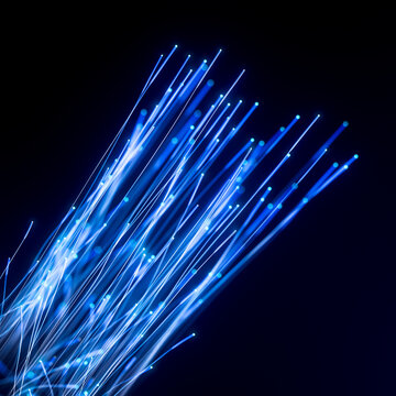 Diagonal fiber optic stream with cyan data points and rapid light flow 3D