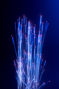Vertical fiber optic bundle with bright signal points and copy space 3D