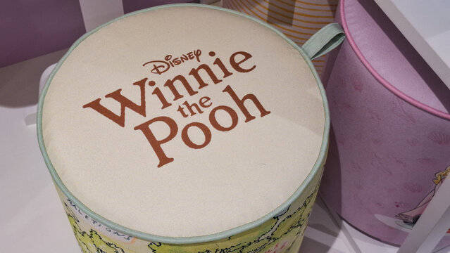 Official Disney Winnie The Pooh Round Fabric Storage Basket Organiser Container Displayed In Retail Store on September 23, 2026 in Bangkok, Thailand 