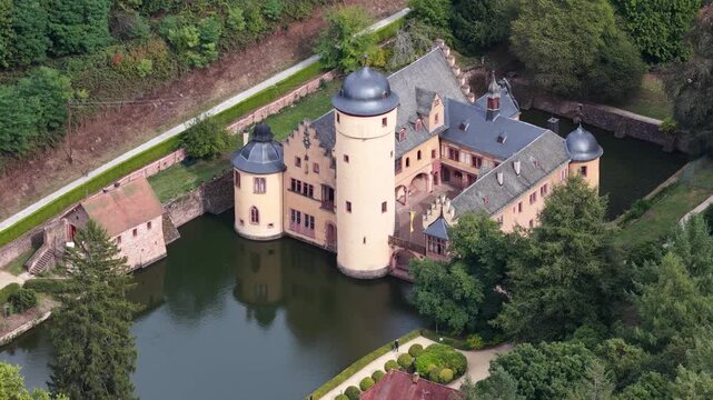 Mespelbrunn castle water surrounded by forest and moat