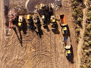 Aerial Top View of Heavy Construction Machinery and Earthmoving Equipment on Civil Works Site © Aleksandar