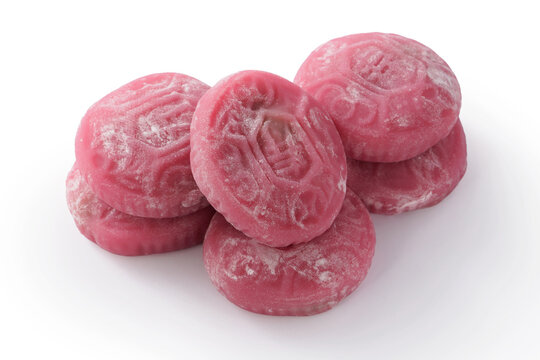 Traditional pink red turtle rice cake isolated on white background with clipping path