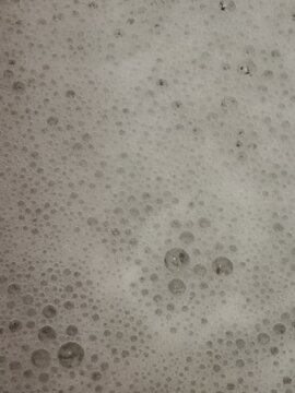 White bubble soap at sink metal,dishwash,clean,bubble pop.