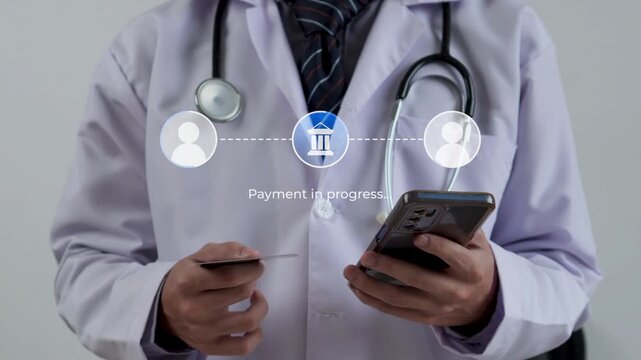 Doctor using smart phone and credit card for Direct peer-to-peer bank payment transfer processing
