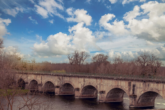 Digoin canal bridge. Boat canal bridge over Laura river in early spring. Digoin, France