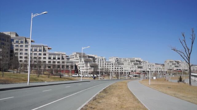 FEFU campus on Russky Island, Vladivostok, Russia, with modern university dormitory buildings and quiet surroundings.
