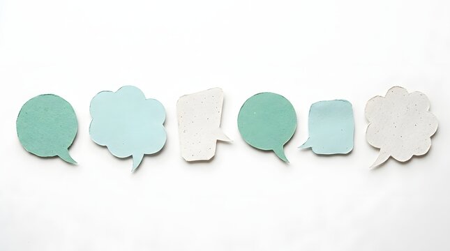Set of diverse paper speech bubbles in soft blue and mint hues for digital interface designs.