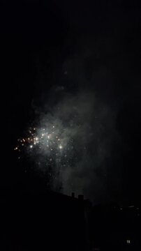 Colorful festival fireworks bursting in the Olot night sky