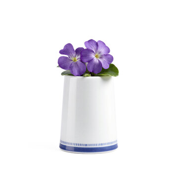 Bone china thimble. A micro-bouquet of violets (Viola odorata) in purple tucked into an oversized bone china thimble with a