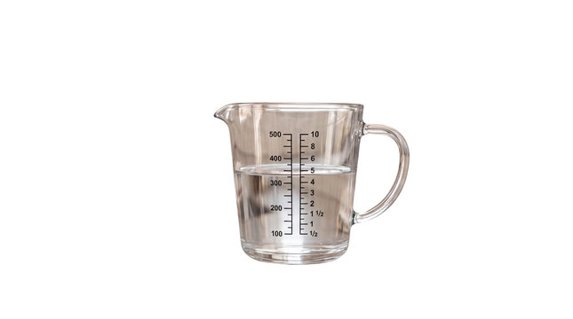 Clear glass measuring cup filled with water, transparent liquid pitcher for kitchen baking and cooking isolated PNG with Transparent Background