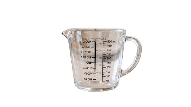 Clear glass measuring cup with measurement markings, culinary baking liquid container, kitchen cooking utensil for recipe preparation isolated PNG with Transparent Background