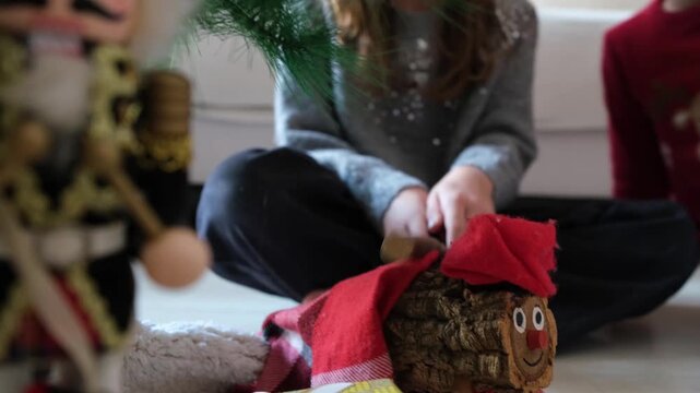 Child hitting a traditional catalan christmas caga ti&oacute;