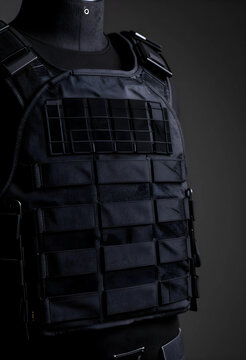 Tactical security and personal protection, black body armor vest for law enforcement and military defense equipment on a mannequin in a dark studio