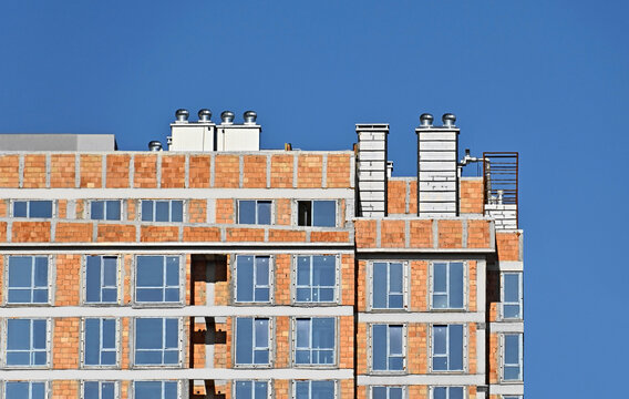 Residential house from red brick construction