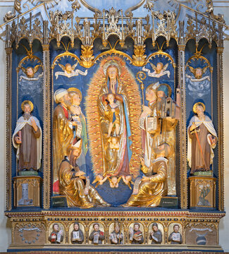 Bergamo -  The detail of carved polychrome altar  of Immaculate Conception in the church Chiesa di Santa Agata by Jacopino Scipioni (1470 &ndash; 1532)