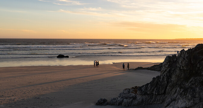 sunset and dusk descending upon the iconic rock formations of Grotto and Voelklip Beaches, Hermanus, South Africa
