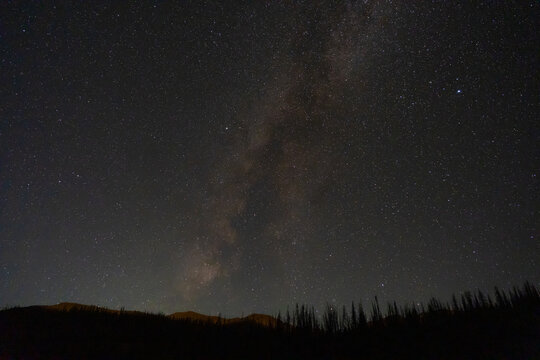 Aerial view of the Milky Way galaxy above the dark silhouette of San Luis Peak and West Willow Creek Trailhead Colorado Trail and Continental Divide Trail Spring Creek Basin Saguache County, Colorado