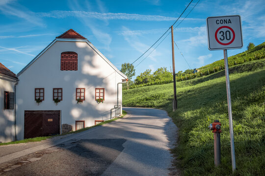 Natural landscape of old house on green hills.
