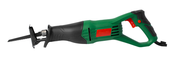 Obraz premium Cordless saw with green handle and black grip used for cutting tasks
