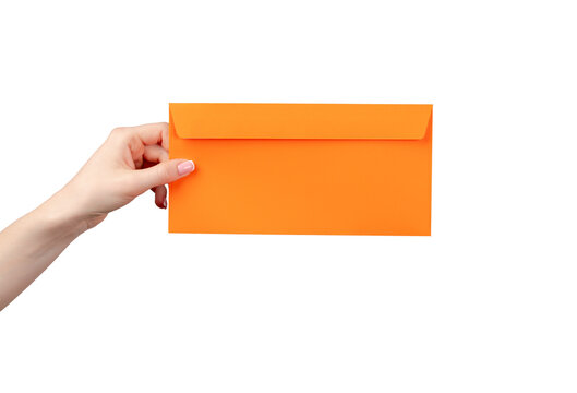 Hand holding an orange envelope in front of a plain background