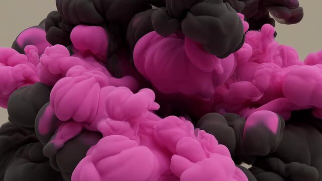 Pink and black ink clouds billow and spread through liquid against a beige background