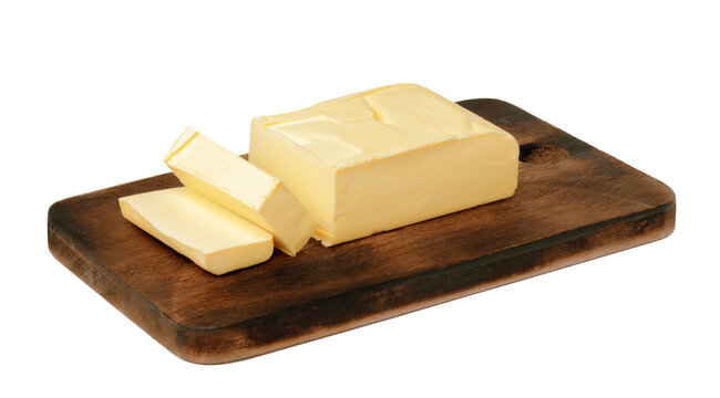 Butter on a wooden cutting board with slices cut from the block