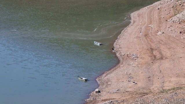 two boats on kukes lake albania at a sunny day