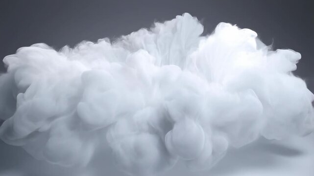 White smoke cloud expands into a billowing plume against a plain gray background