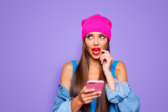 Oops I have bad memory! Close up photo portrait of cute attractive pretty thoughtful minded lady looking up holding finger near mouth using telephone isolated pastel background
