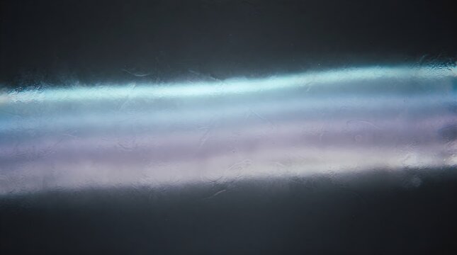 Abstract horizontal bands of blue, purple, and pink light flowing across a dark surface, creating a futuristic atmospheric background.