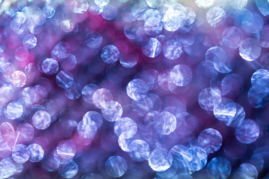 Abstract purple and blue bokeh light background texture