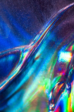 Iridescent holographic texture with vivid rainbow light