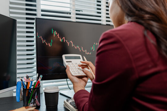 Professional financial market analysis in a modern office, showing investment research, stock market monitoring, technical chart evaluation, and strategic trading decisions for business growth.