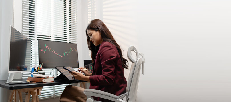 Professional trader monitoring financial markets and analyzing investment opportunities across multiple trading platforms, representing stock analysis, market research.