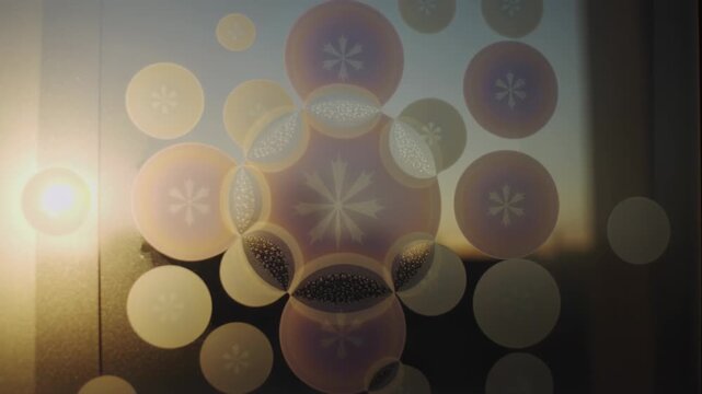Shifting sunlight revealing frosted decal cluster on window, forming halos, skyline as sun moving