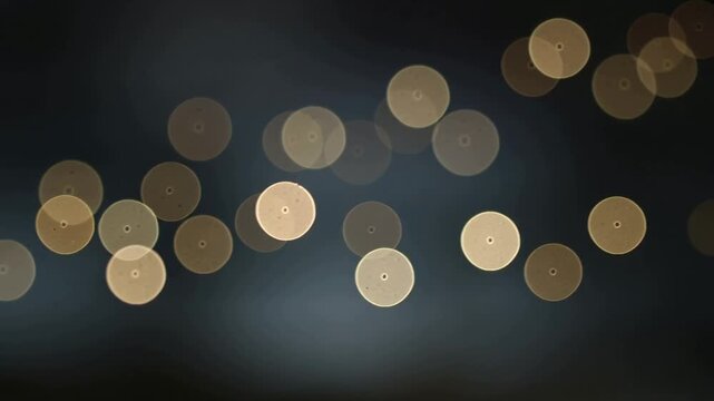 Shifting row of warm bokeh lights drifting in dim low-light scene after shift, showing lens dot