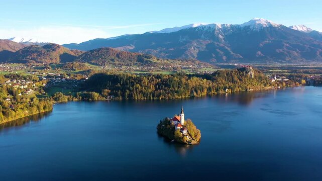 Wide aerial view of Lake Bled island in autumn Slovenia