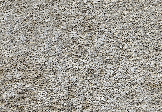 Background with plaster from concrete granules