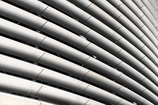 Contemporary architectural facade with diagonal geometric lines