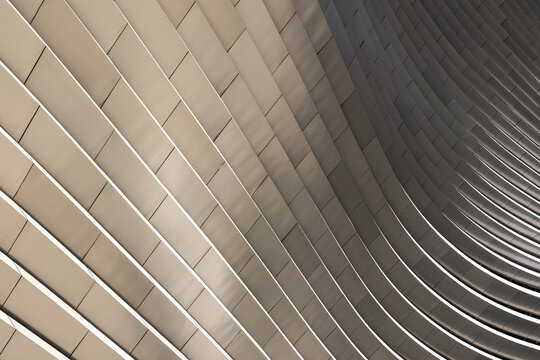 Curved metal facade with geometric structural lines