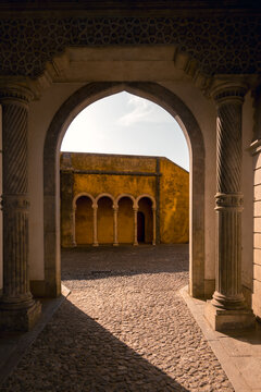 Arched courtyard view at Pena Palace in Sintra, Portugal