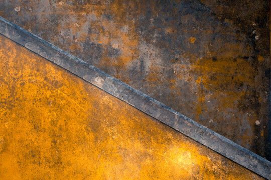 Weathered yellow and gray wall texture in Sintra, Portugal