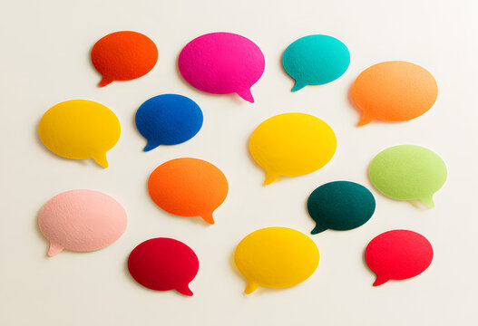 Communication and feedback concept, colorful speech bubbles for social media interaction and messaging on a neutral background with space for text