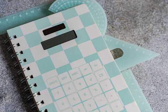 Pastel calculator notebook and ruler for school learning tools