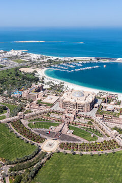 Abu Dhabi skyline aerial view photo with UAE Presidential Palace and Emirates Palace in Abu Dhabi, United Arab Emirates