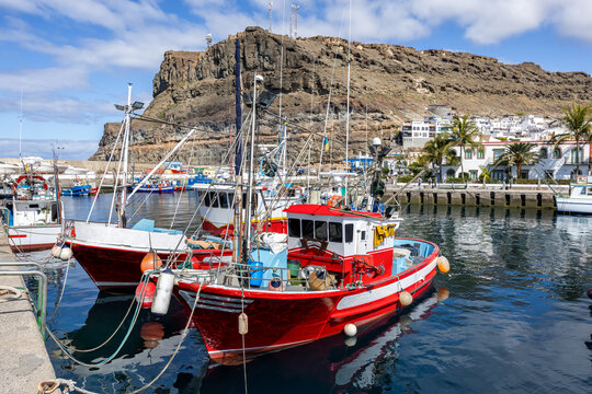 Gran Canaria island boats in Puerto de Mogan port harbor marina on Canary Islands holiday in Spain