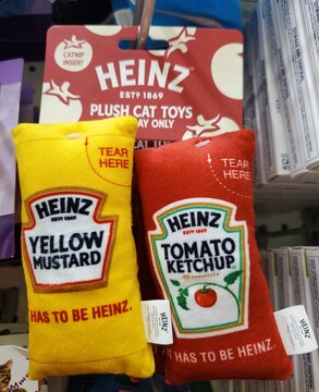 Wilmington, Delaware, U.S.A - Sept 20, 2026 - Heinz Cat Toys shaped like mustard and ketchup bottles containing catnip.