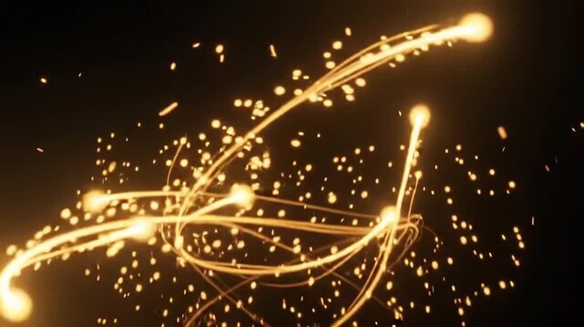 Glowing golden energy trails and particles swirling in motion video footage