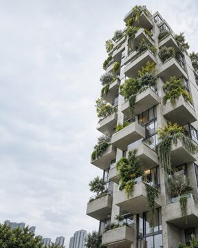 Modern Residential Tower with Vertical Forest and Green Balconies